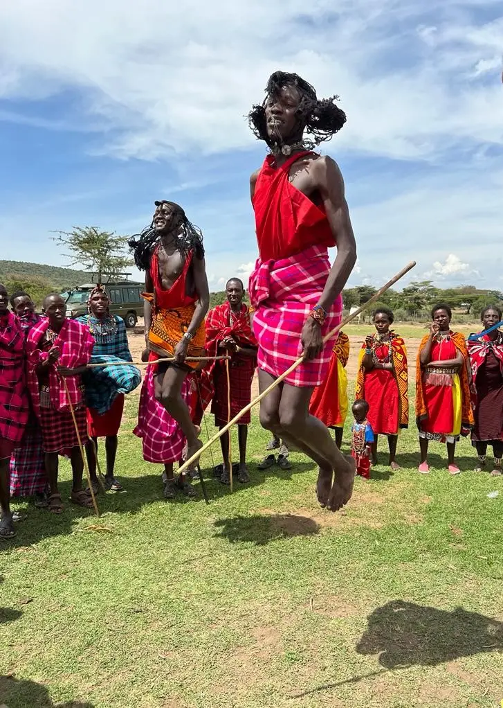 Maasai Mara Village Welcome by Africa Is Open Tour